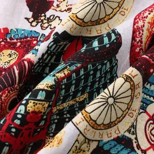 Close-up of the breathable cotton-linen fabric with vintage Paris-themed Hawaiian print.