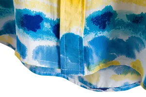 Close-up of blue and yellow watercolor print on men's casual floral short sleeve shirt.