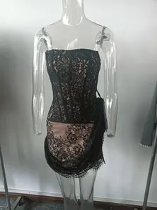 Detailed view of black floral lace corset dress featuring a sexy strapless mesh design