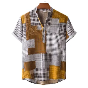 Close-up of casual patchwork linen shirt with plaid and houndstooth patterns