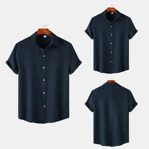 Detail view showing front and back of navy blue men's textured short sleeve shirt