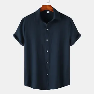 Detailed view of the navy blue short-sleeved men's shirt with premium textured fabric