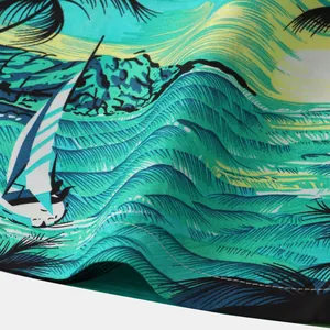 Macro view of tropical wave and sailboat print on high-quality cotton linen beach shorts fabric