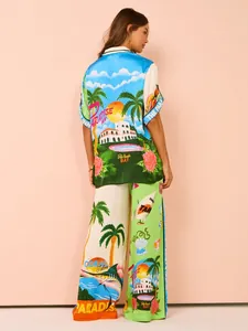 Back view of a vibrant tropical print resort wear set with shirt and wide-leg pants