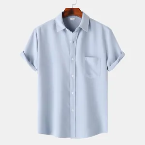 Close-up of light blue men's short sleeve waffle texture casual shirt with chest pocket