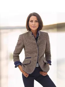 Elegant women's brown tweed jacket featuring multi-button detail and navy blue piping.