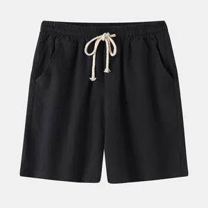 Détail du short en coton et lin noir pour homme avec cordon de serrage blanc