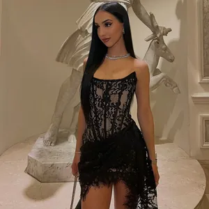 Detailed close-up of a sexy black lace mesh strapless bodycon dress with bustier design