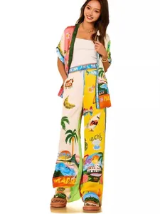 Women's colorful tropical print two-piece set with short sleeve shirt and wide leg pants