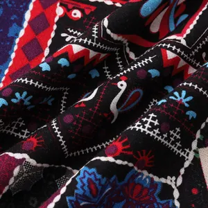 Detailed view of vibrant ethnic geometric patterns on a breathable Hawaiian shirt fabric