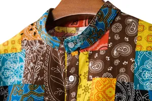 Detailed view of a men's vintage paisley patchwork linen shirt with a stand-up collar