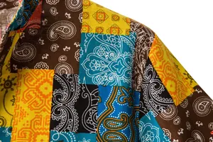 Close-up of vintage paisley patchwork pattern on breathable linen cotton shirt