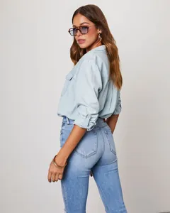 Western style casual light blue denim long sleeve shirt for women shown by model