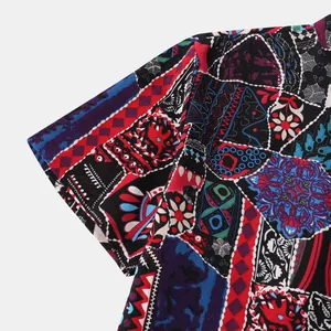 Macro view of colorful patchwork ethnic print on men's summer casual Hawaiian shirt
