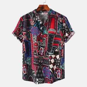 Detail of men's short sleeve shirt with eclectic Hawaiian patchwork print on a hanger