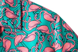 Macro detail of tropical pink flamingo print on a teal men's short sleeve casual shirt