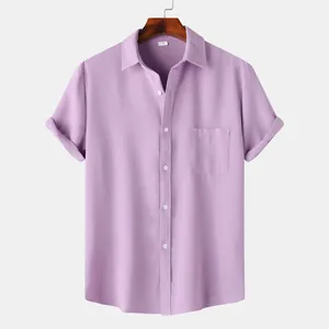 Close-up of lavender men's short sleeve shirt with textured fabric and chest pocket detail.
