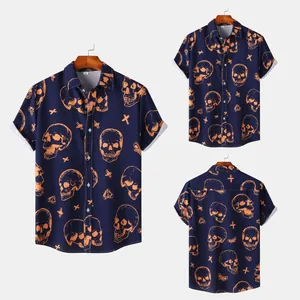 Detail view of men's navy short-sleeve shirt featuring an orange skull graphic print
