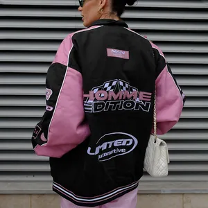 Detailed view of the back of a black and pink racing-style jacket with bold graphic prints.