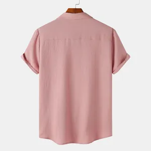 Detailed back view of men's short sleeve textured button-down shirt in dusty rose color