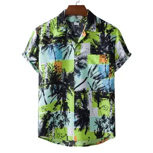 Detailed view of a men's Hawaiian short sleeve shirt with vibrant palm tree print