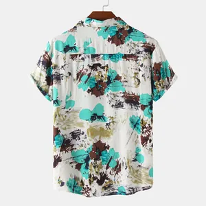 Back view of a casual Hawaiian beach shirt with abstract teal and brown floral prints