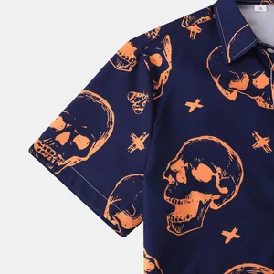 Detail shot of navy blue Halloween shirt with orange skull and moth prints