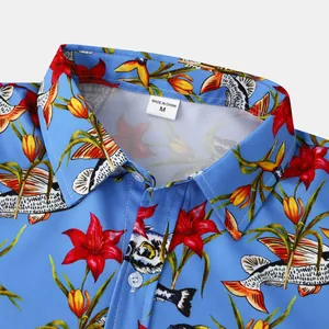 Close-up detail of a blue tropical floral shirt collar with size M tag shown