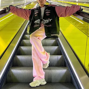 Stylish pink and black motor-style bomber jacket with cool vintage sports prints