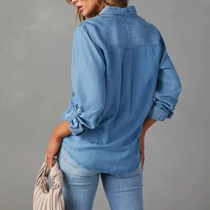Women's casual light blue denim shirt with back pleat detail and button cuffs for daily wear