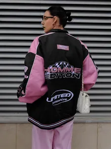 Oversized women's racer jacket in pink and black with vintage motor sport prints