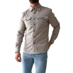 Stylish men's khaki casual long sleeve button-down shirt featuring dual chest pockets