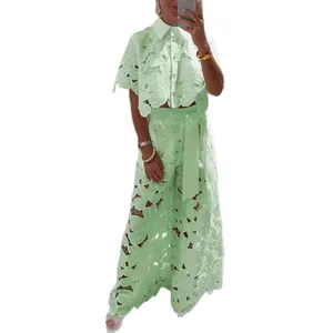 Elegant mint green hollow-out lace two-piece set with cardigan top and wide-leg pants