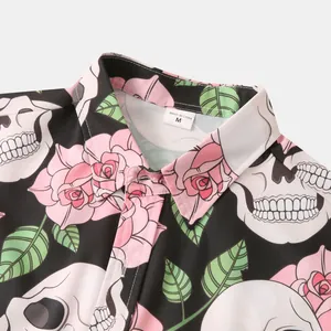 Close-up of Hawaiian shirt collar featuring skull and rose print, size M label shown clearly.