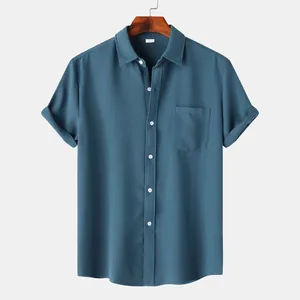 Detail view of men's blue short sleeve casual button down shirt with waffle texture