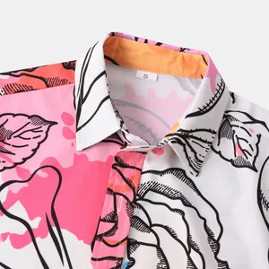 Detailed view of the vibrant floral print collar on a men's casual beach shirt, size S