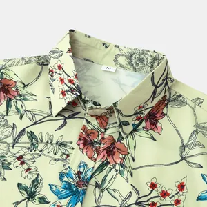 Detailaufnahme eines Vintage-Blumenmusters auf einem kurzärmeligen Herrenhemdkragen