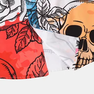 Detailed macro shot of a Halloween shirt featuring vibrant skull and rose pattern prints
