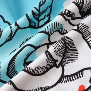 Macro view of lightweight woven fabric with blue and white leaf pattern for casual shirt