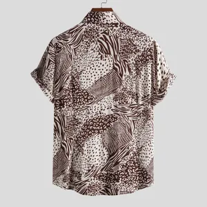 Detailed back view of a men's short sleeve shirt with brown mixed animal prints.