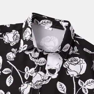 Close-up detail of a men's shirt collar featuring white skull and rose floral prints.