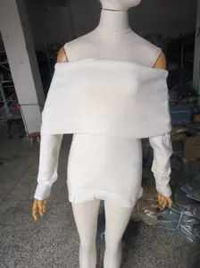 Detail view of a white off-the-shoulder long sleeve ribbed knit sweater on a mannequin.