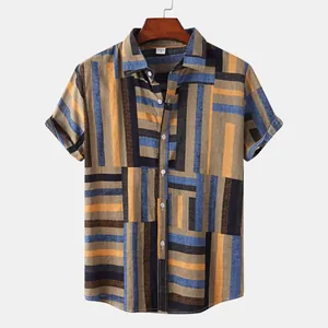 Detailed view of men's short-sleeved casual shirt with bold colorful geometric stripes