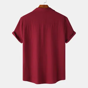 Detailed back view of men's burgundy short-sleeved shirt with textured breathable fabric