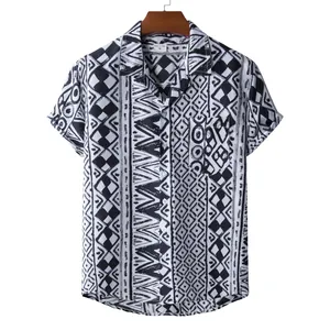Close-up of men's short-sleeved Hawaiian shirt with black and white ethnic geometric print
