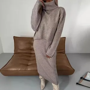 Elegant beige turtleneck sweater and long knit skirt two-piece outfit for autumn