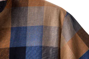 Close-up of the breathable cotton-linen fabric and blue-orange plaid pattern