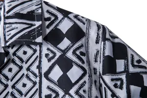Detailed view showing the fabric and collar of a men's ethnic print short sleeve shirt