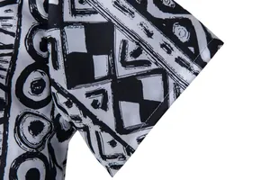 Detailed close-up showing the black and white ethnic pattern on a Hawaiian shirt sleeve