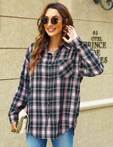 Detailed view of stylish pink and black plaid long sleeve shirt with front pocket